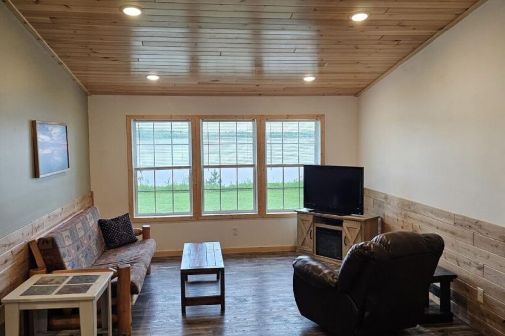 Cabin #2 - Living Room with Log Futon Couch and Lakefront Views