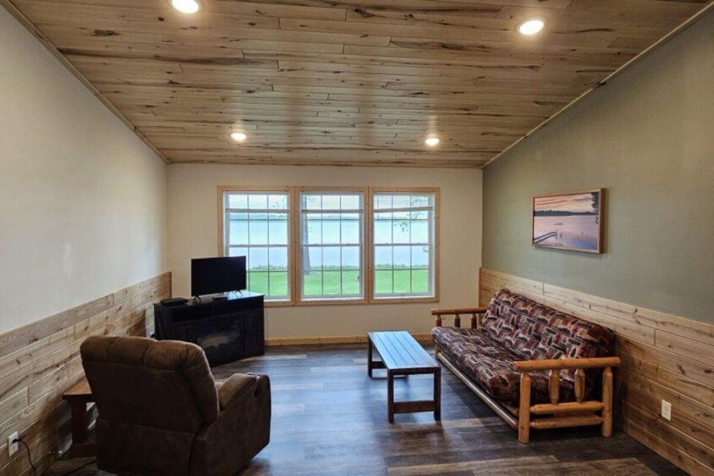 Cabin #5 - Living Room with Log Futon Couch and Lakefront Views