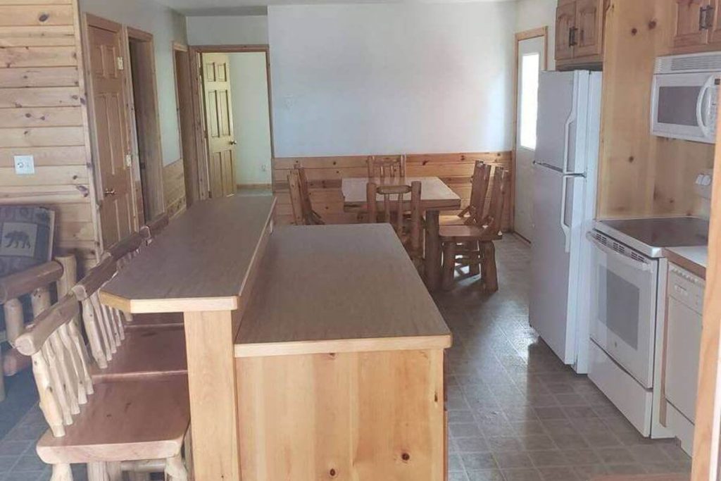 Cabin #19 - Fully Equipped Kitchen with Counter Seating and Dining Area