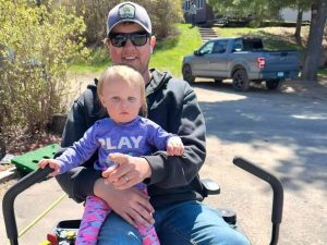 Helping Daddy Mow the Lawn