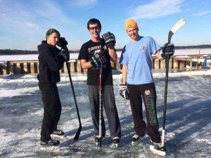Ruzek Brothers Playing Ice Hockey on Cass Lake