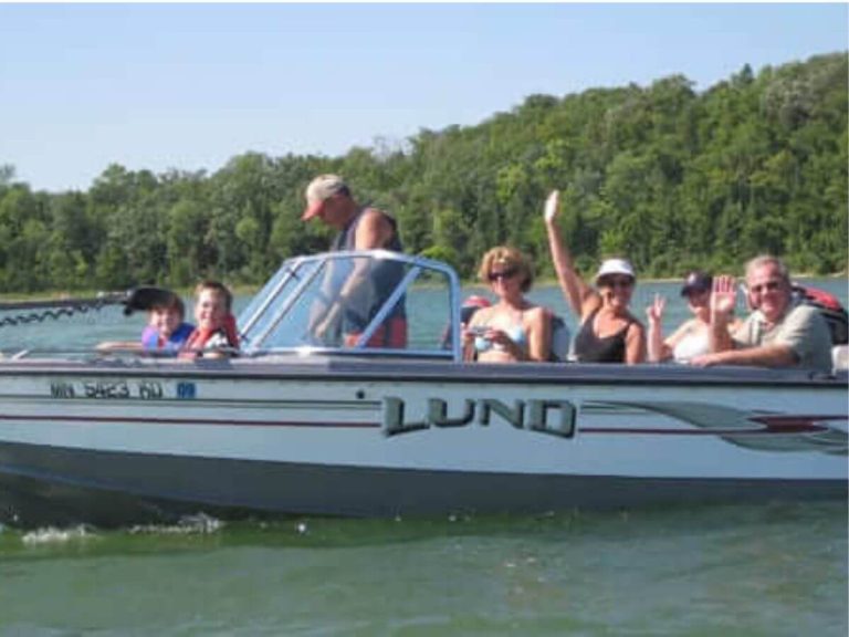 Resort Guests Taking Off for a Day of Cass Lake Fun in a Lund Aluminum Fishing Boat