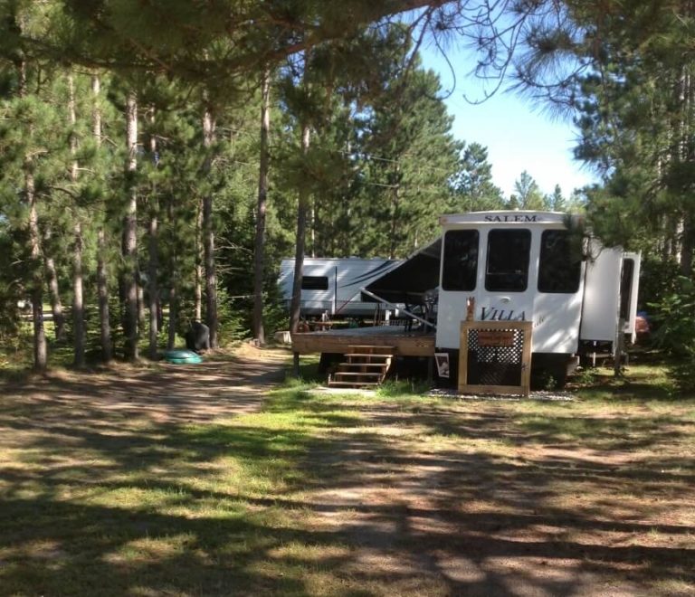 A Seasonal RV Site Tucked into the Pine Trees