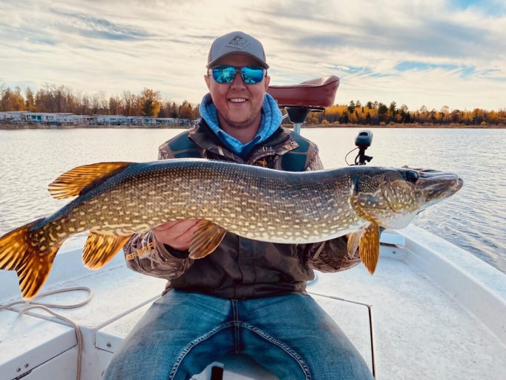 Cass Lake Angler Ben Ruzek Proudly Displays His Large Northern Pike Catch of the Day
