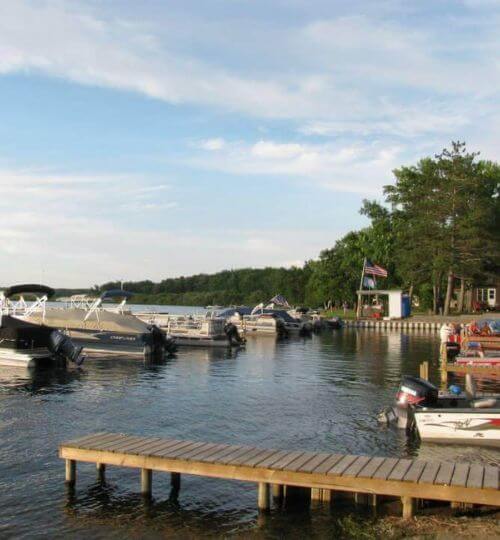 Covered Pontoons and Fishing Boats Docked at the Harbor at Sunset Cove Resort