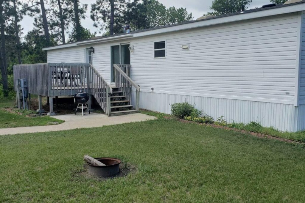 Cottage #9 - Front Exterior with Deck, Fire Ring, and Weber Charcoal Grill