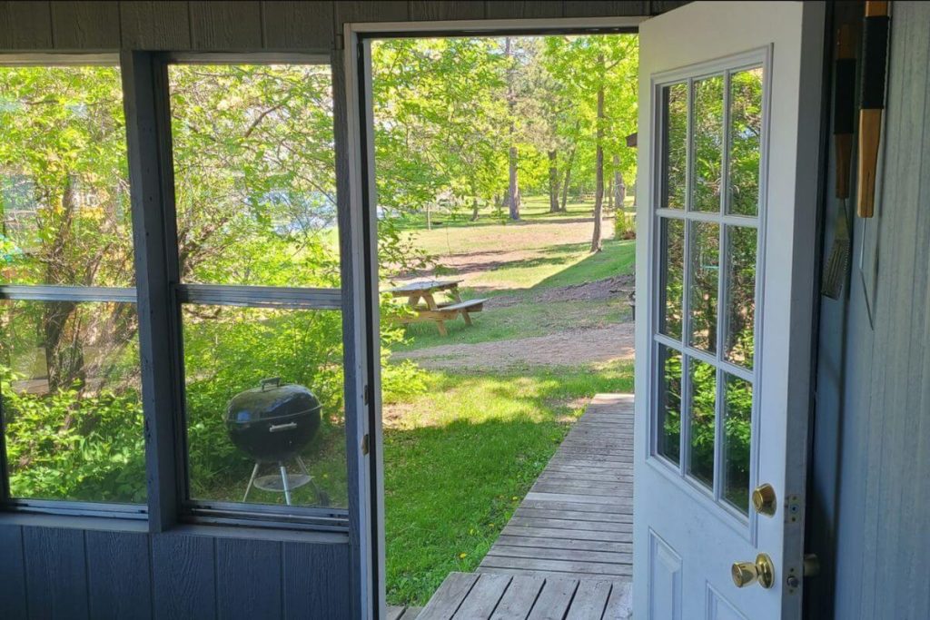 Cottage #17 - Front Door with Picnic Table and Weber Charcoal Grill
