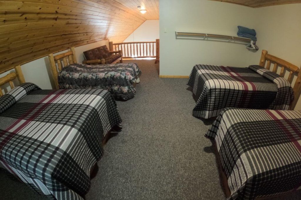 Cabin #19 - Loft Bedroom with Two Double Beds, Two Single Beds, and Log Futon Couch