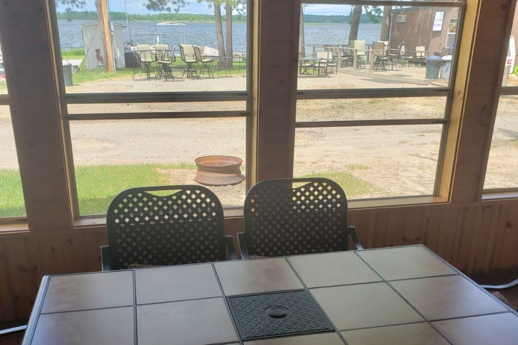 Cabin #18 - 3-Season Porch with Dining Area, Fire Ring, and Cass Lake Views