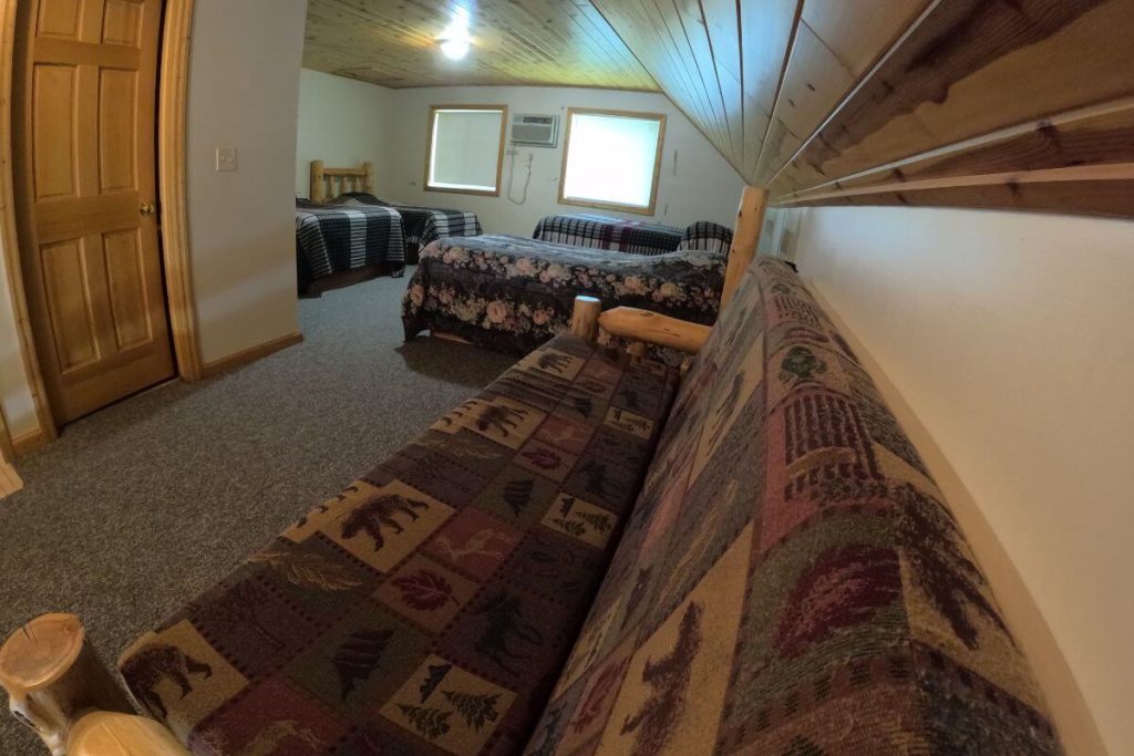 Cabin #19 - Loft Bedroom with Two Double Beds, Two Single Beds, and Log Futon Couch