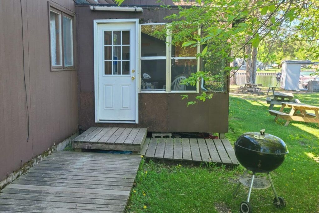 Cottage #17 - Front Door Exterior with Weber Charcoal Grill