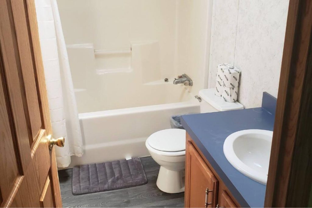 Cottage #9 - Full Bathroom #2 with Double Sink Vanity, Tub, and Shower